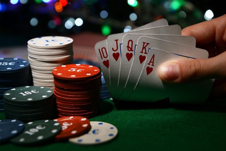 Blackjack table with dealer and player cards visible on screen